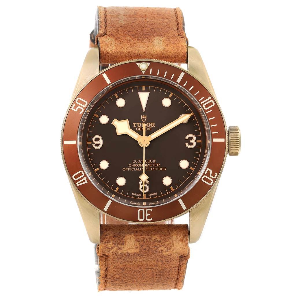 The image shows the Tudor Heritage Black Bay 79250B Men's Bronze Brown Dial 79250B Men's Bronze Brown Dial watch from a front angle, highlighting its dial, bezel, and leather strap.