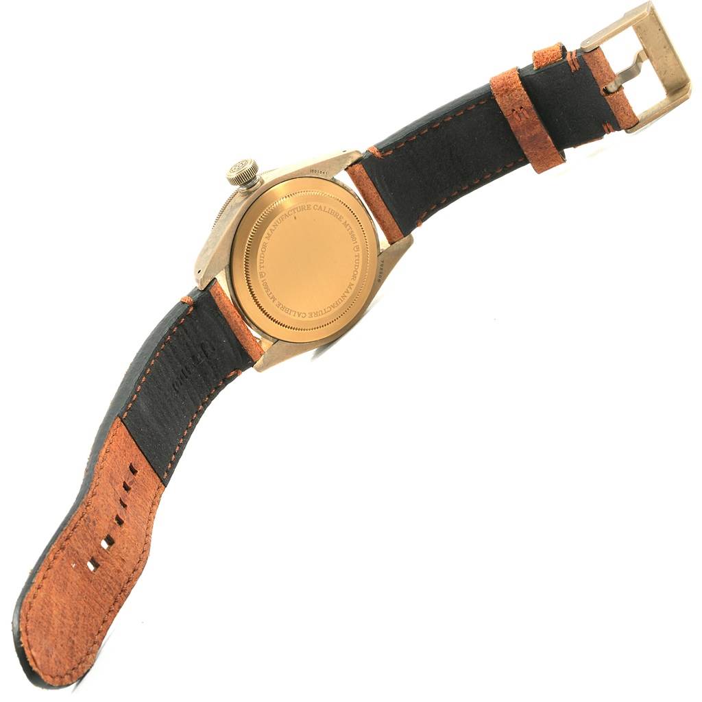The image shows the back case and strap of a Tudor Heritage Black Bay 79250B Men's Bronze Brown Dial 79250B Men's Bronze Brown Dial watch.