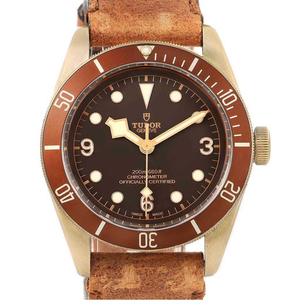The image shows a Tudor Heritage Black Bay 79250B Men's Bronze Brown Dial 79250B Men's Bronze Brown Dial watch front view, displaying its brown dial, bezel, and leather strap.