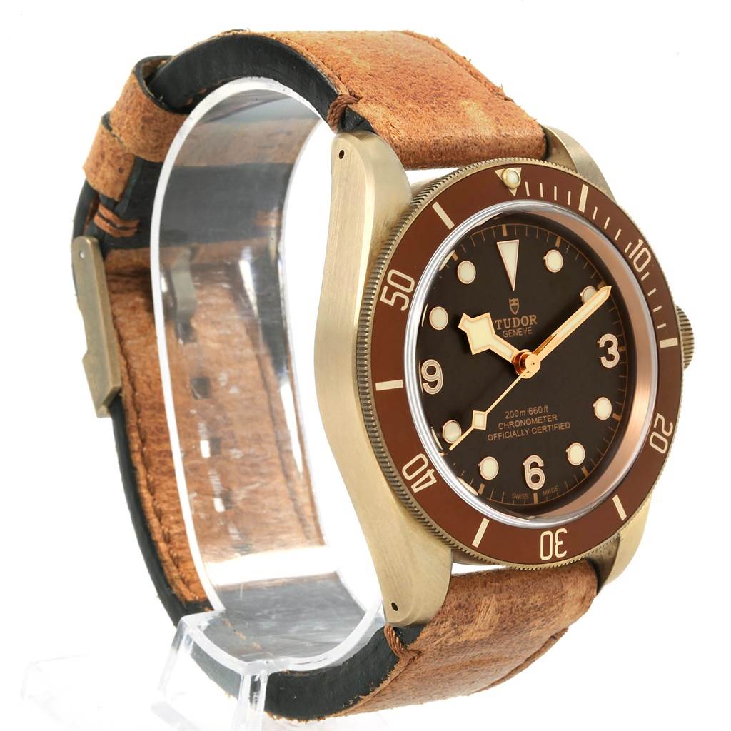 The image shows a Tudor Heritage Black Bay 79250B Men's Bronze Brown Dial 79250B Men's Bronze Brown Dial watch, highlighting the dial, bezel, and strap from a slight angle.