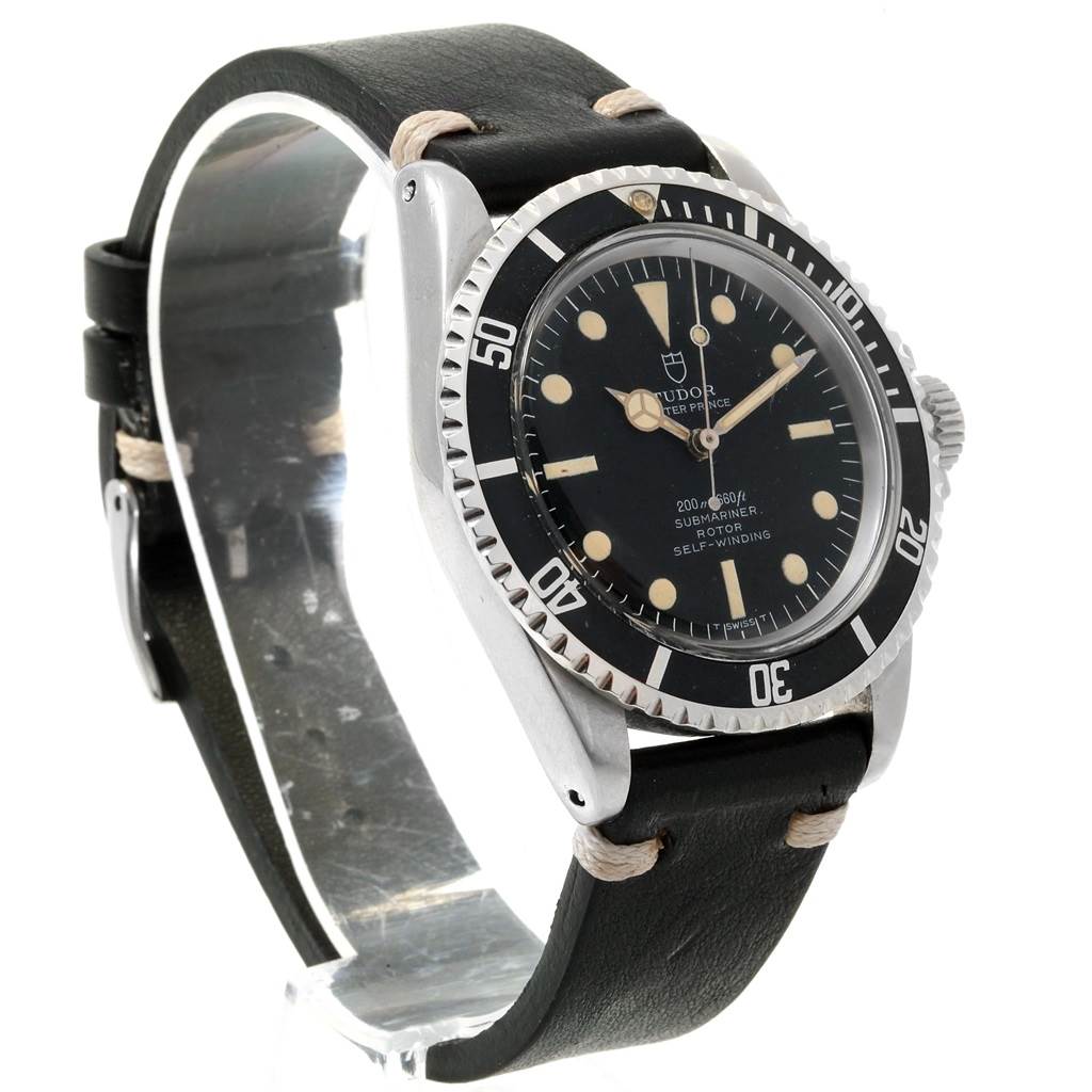 The Tudor Submariner 7928 Men's Stainless Steel Black Dial 7928 Men's Stainless Steel Black Dial watch is shown from a front-side angle, displaying the dial, bezel, crown, and leather strap.