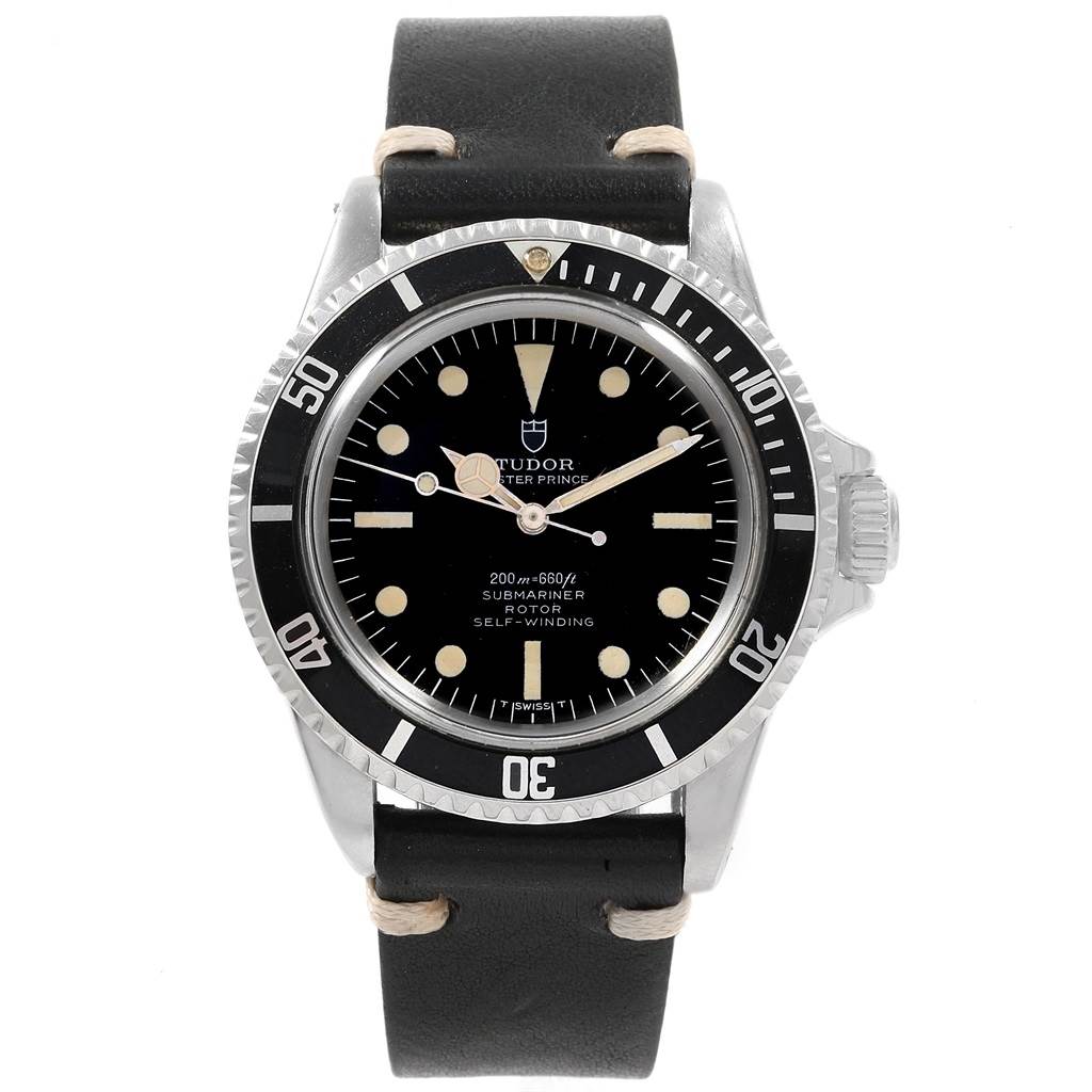 This image shows a frontal view of a Tudor Submariner 7928 Men's Stainless Steel Black Dial 7928 Men's Stainless Steel Black Dial watch with a black dial and bezel, silver indices, and a black leather strap.