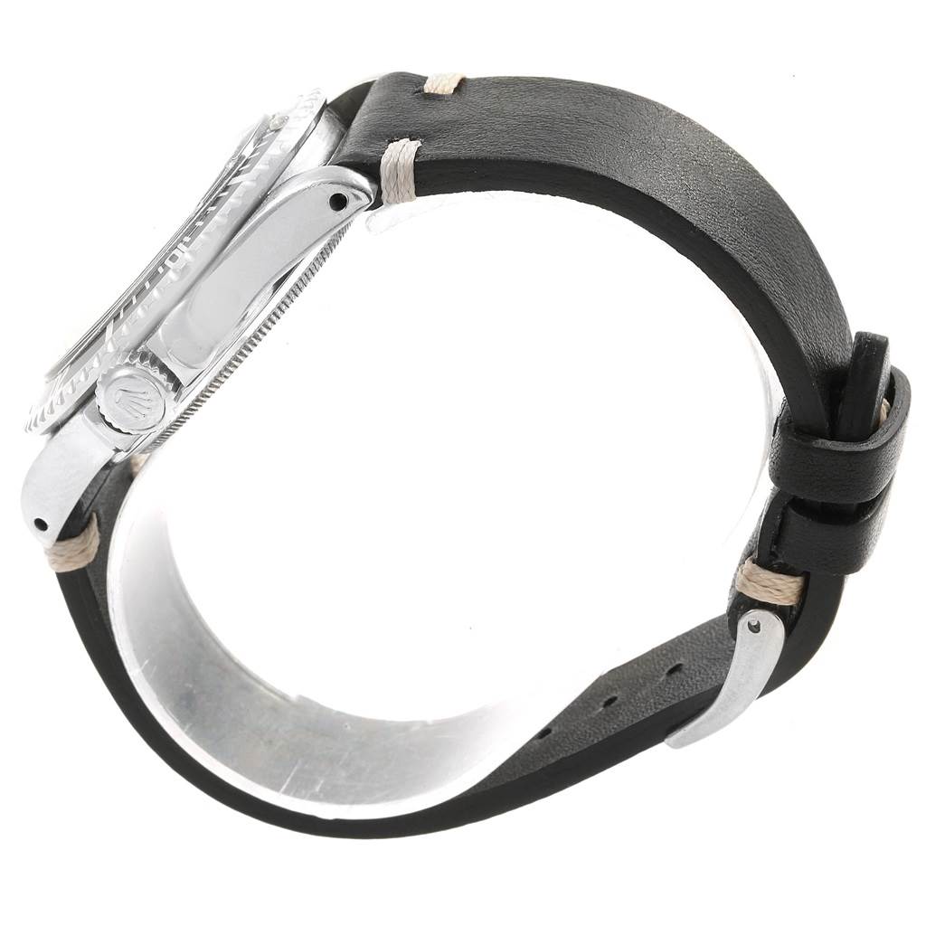 The image shows a side view of a Tudor Submariner 7928 Men's Stainless Steel Black Dial 7928 Men's Stainless Steel Black Dial watch, focusing on the case, bezel, crown, and leather strap with stitching.