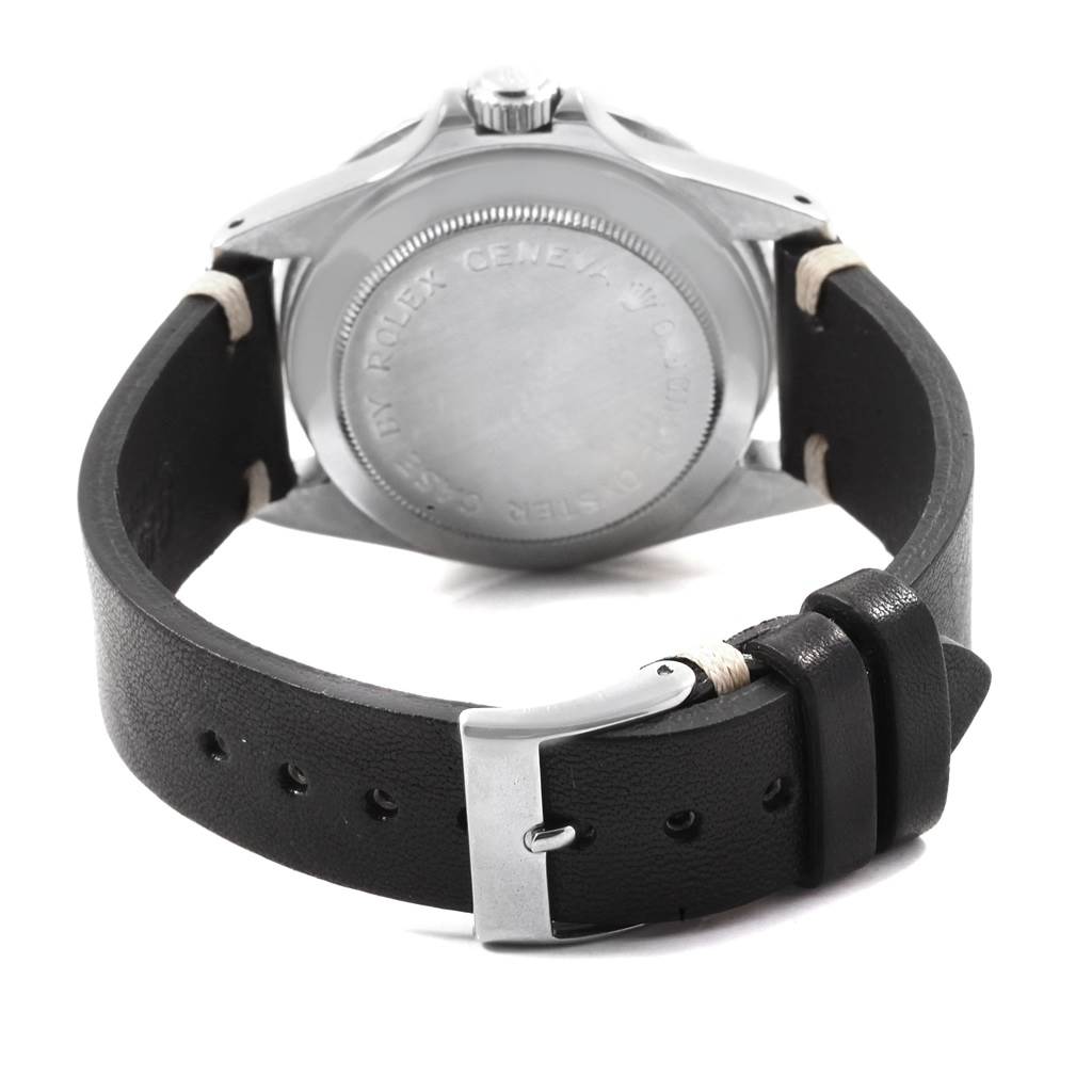 The image shows the back and buckle of a Tudor Submariner 7928 Men's Stainless Steel Black Dial 7928 Men's Stainless Steel Black Dial watch, with the leather strap and engraved caseback visible.