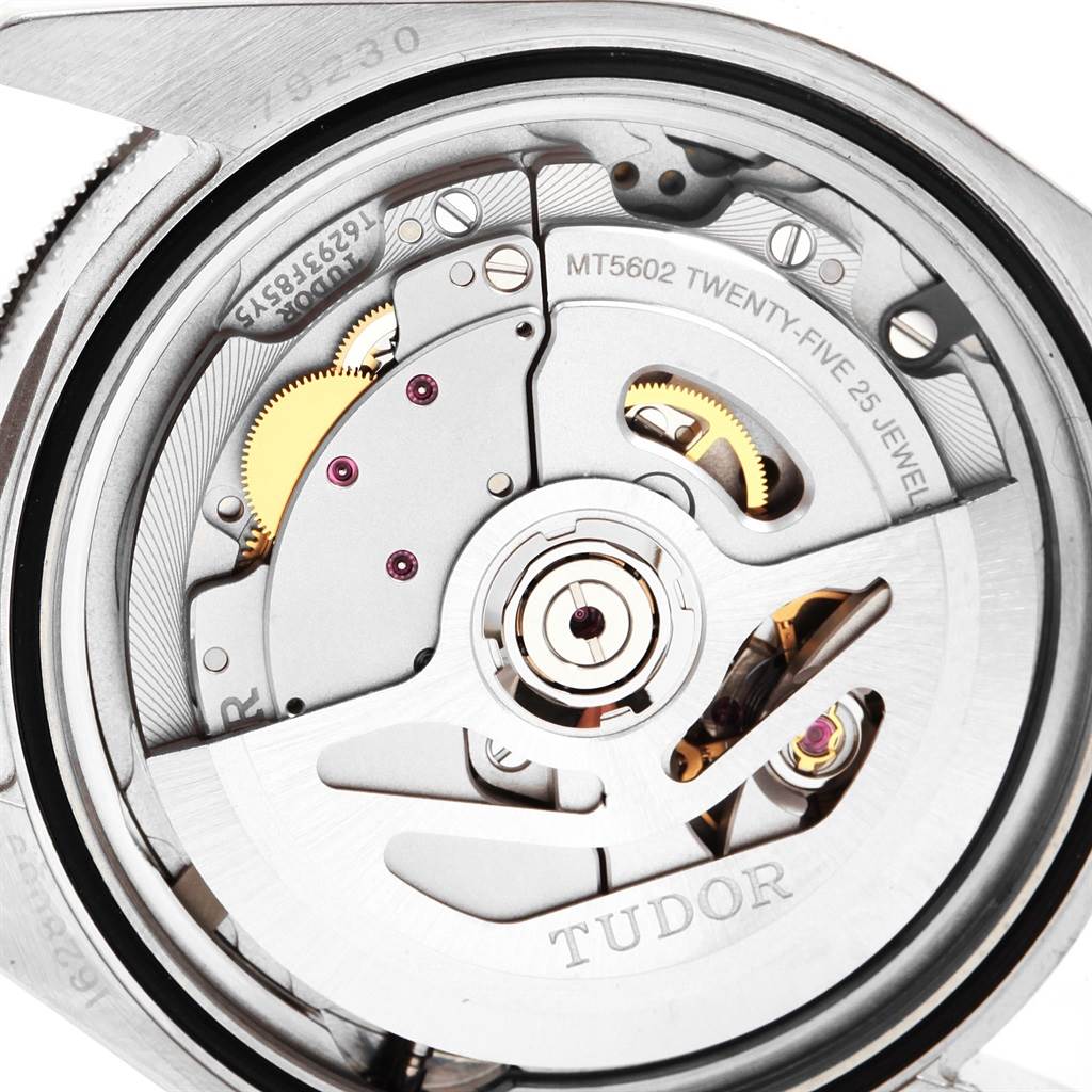 The image shows an angled view of the movement mechanism inside the Tudor Heritage Black Bay 79230 Men's Stainless Steel Black Dial 79230 Men's Stainless Steel Black Dial watch.