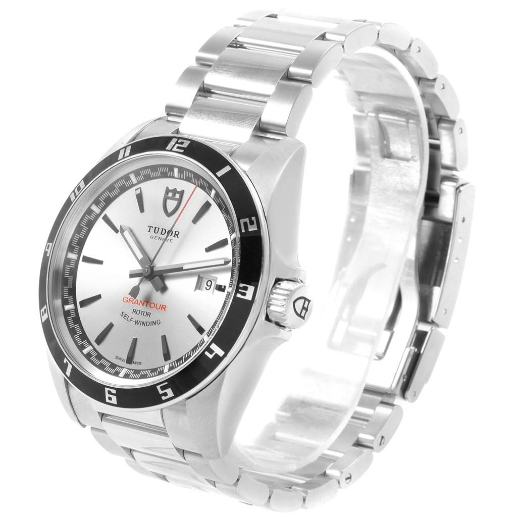 The Tudor Grantour 20500N Men's Stainless Steel Silver Dial 20500N Men's Stainless Steel Silver Dial watch is shown at a slight angle, highlighting its face, bezel, and metal bracelet.