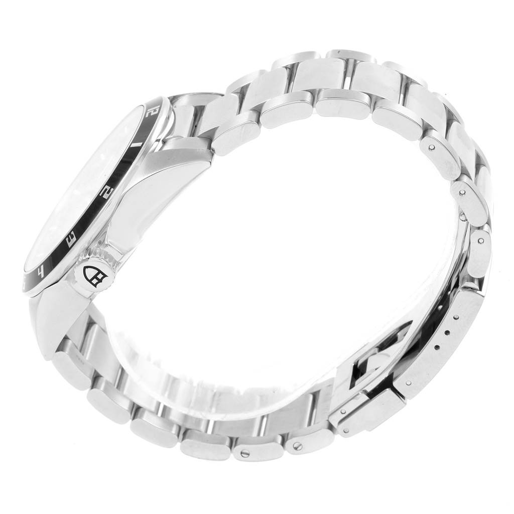 The image shows a side view of the Tudor Grantour 20500N Men's Stainless Steel Silver Dial 20500N Men's Stainless Steel Silver Dial watch, highlighting its stainless steel bracelet and part of the bezel.