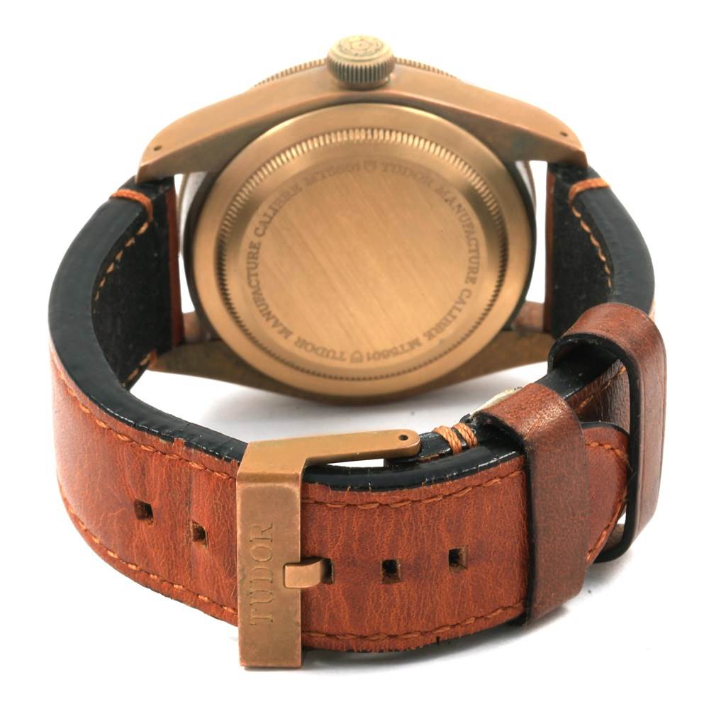 The image shows the back case and leather strap of a Tudor Heritage Black Bay 79250B Men's Bronze Brown Dial 79250B Men's Bronze Brown Dial watch.