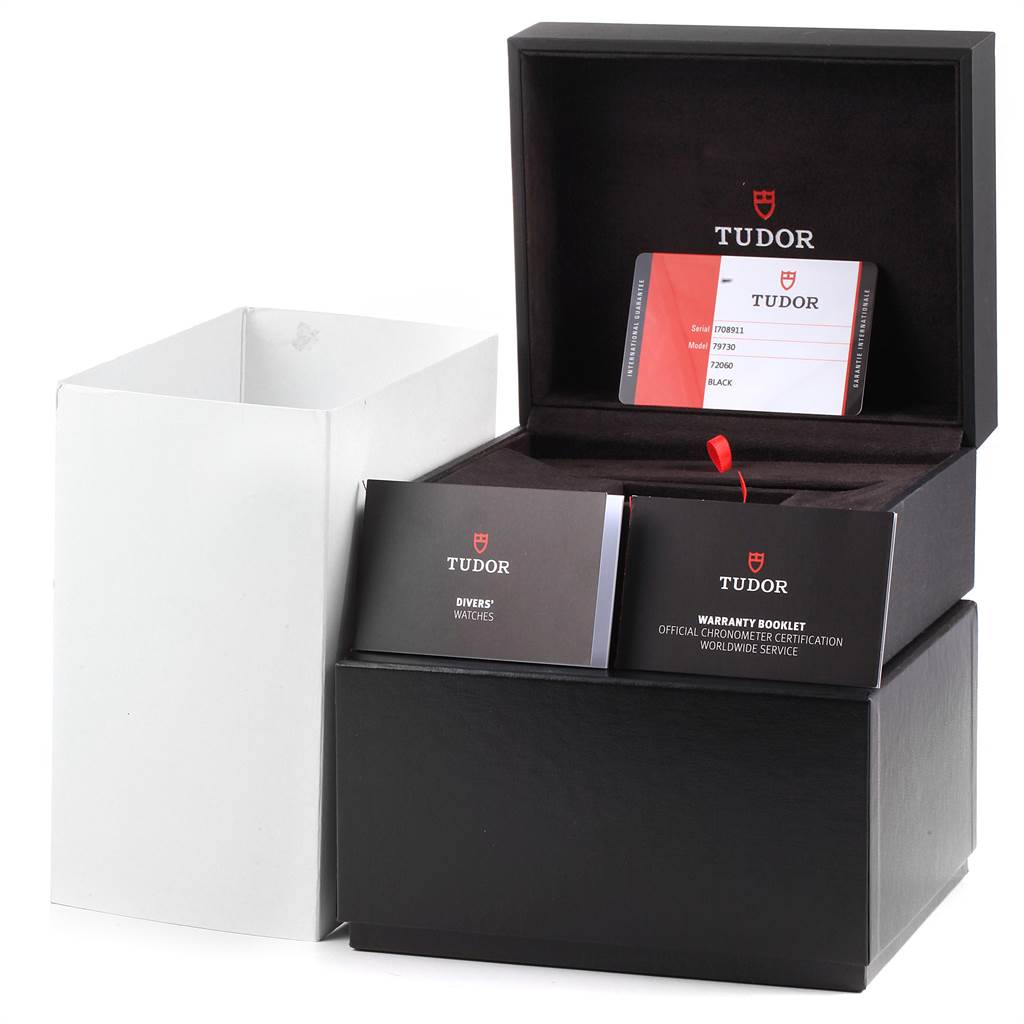 The image shows the packaging, warranty booklet, and card for the Tudor Heritage Black Bay 55020 Men's Stainless Steel Black Dial 55020 Men's Stainless Steel Black Dial watch.