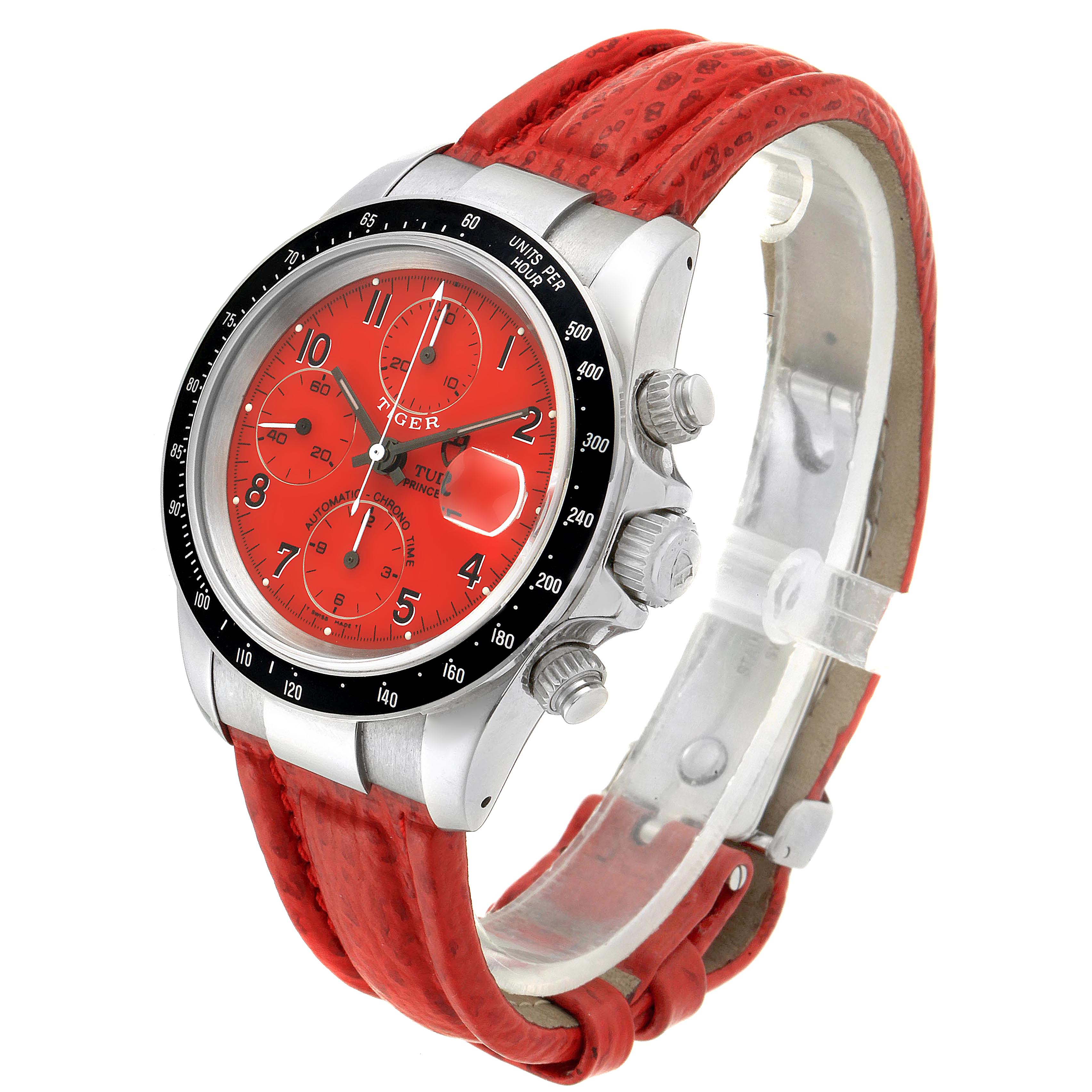 The Tudor Tiger 79260 Men's Stainless Steel Red Dial 79260 Men's Stainless Steel Red Dial model watch is shown at a three-quarter angle, displaying its red dial, bezel, and red strap.