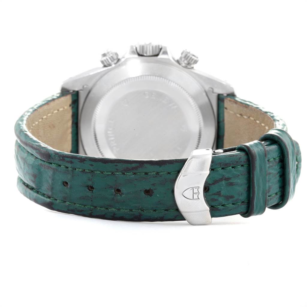 The image shows the back of a Tudor Tiger 79280P Men's Stainless Steel Green Dial 79280P Men's Stainless Steel Green Dial model watch, highlighting its caseback, crown, and green leather strap with a clasp.
