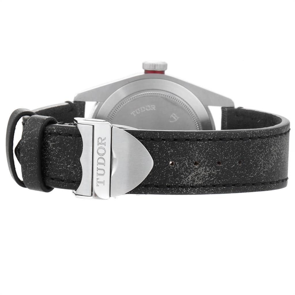 The image shows the rear view of the Tudor Heritage Black Bay 79220R Men's Stainless Steel Black Dial 79220R Men's Stainless Steel Black Dial watch, focusing on the leather strap and clasp.