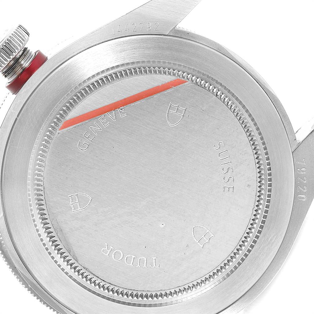 This is the back of the Tudor Heritage Black Bay 79220R Men's Stainless Steel Black Dial 79220R Men's Stainless Steel Black Dial watch showcasing its caseback and part of the crown and lugs.