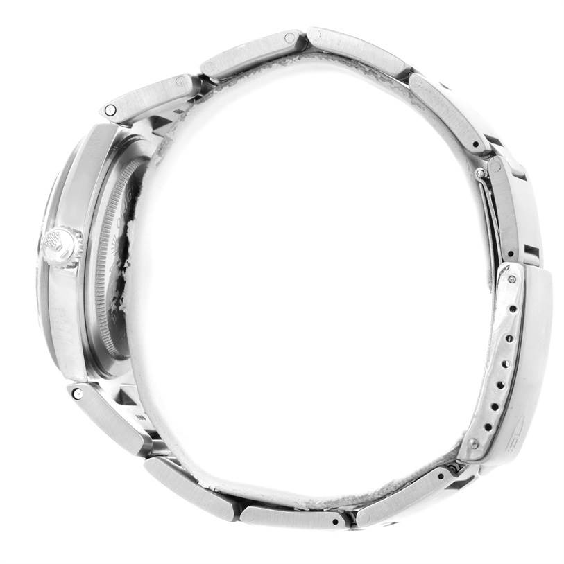 The image shows a side view of a Tudor Prince 9101/0 Men's Stainless Steel Silver Dial 9101/0 Men's Stainless Steel Silver Dial watch, highlighting its case, bracelet, and crown.