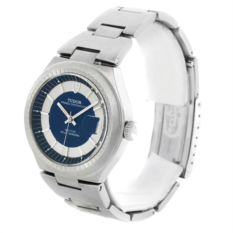 The image shows a Tudor Prince 9101/0 Men's Stainless Steel Silver Dial 9101/0 Men's Stainless Steel Silver Dial wristwatch angled slightly to display the face, bezel, and part of the metal strap.