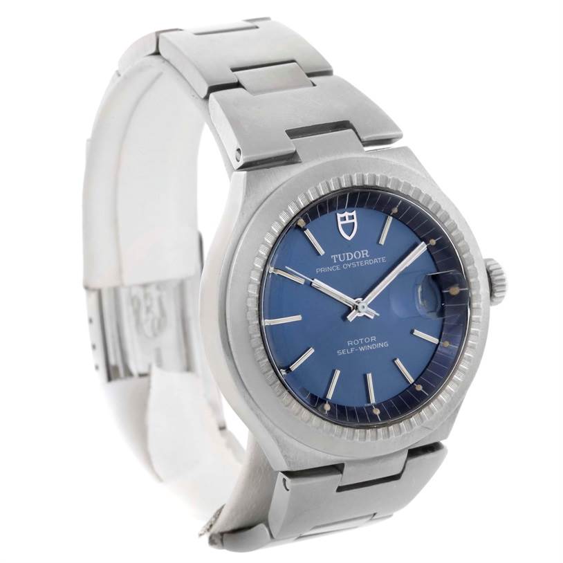 This image shows a Tudor Prince 9101/0 Men's Stainless Steel Blue Dial 9101/0 Men's Stainless Steel Blue Dial Oysterdate watch from a three-quarter angle, highlighting the bracelet, crown, and blue watch face.
