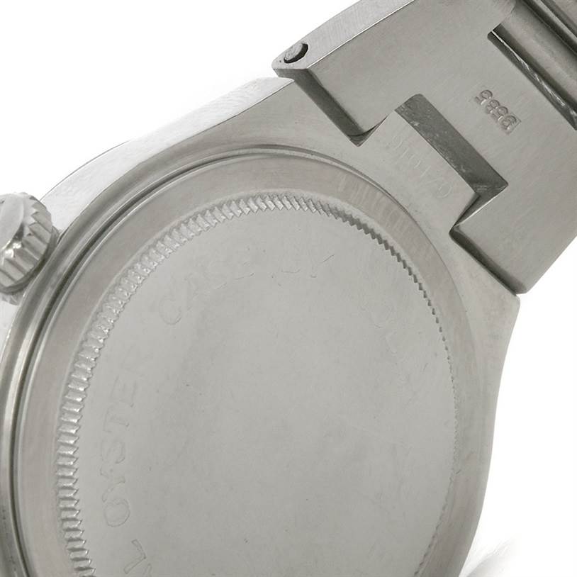 This image shows the back case and crown of a Tudor Prince 9101/0 Men's Stainless Steel Blue Dial 9101/0 Men's Stainless Steel Blue Dial model watch, viewed from a close-up angle.