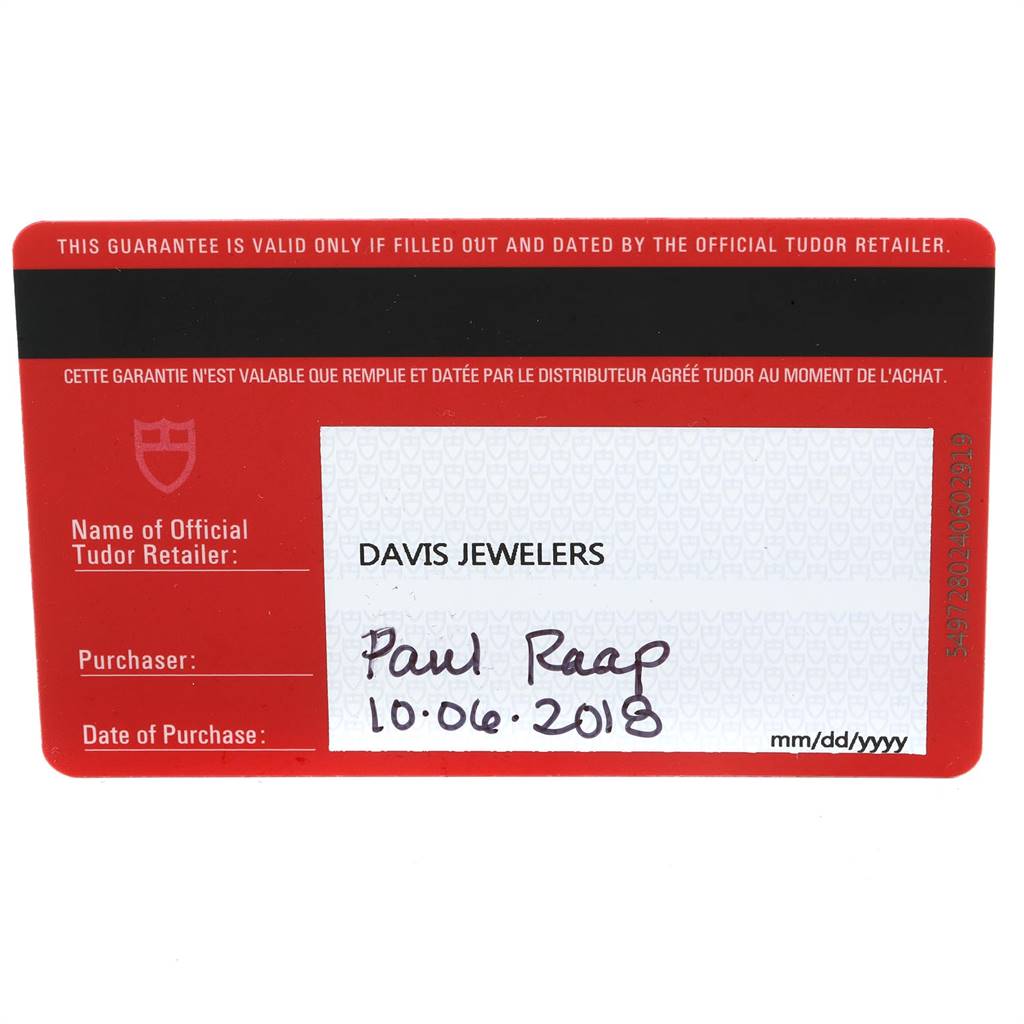 This image shows a purchase warranty card for a Tudor Heritage Black Bay 79230B Men
s Stainless Steel Black Dial 79230B Men
s Stainless Steel Black Dial watch.