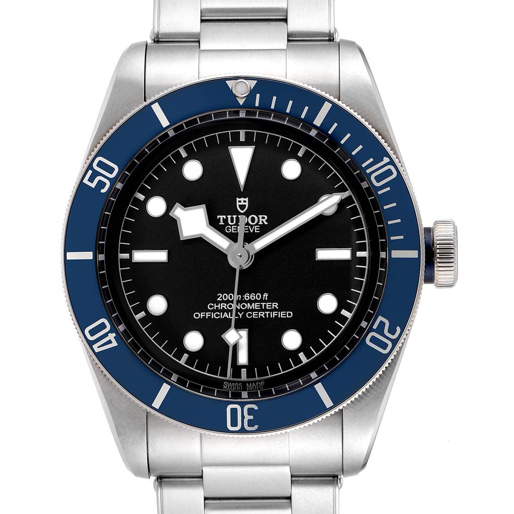 This image shows the front view of the Tudor Heritage Black Bay 79230B Men
s Stainless Steel Black Dial 79230B Men
s Stainless Steel Black Dial watch, highlighting its face, bezel, crown, and metal bracelet.