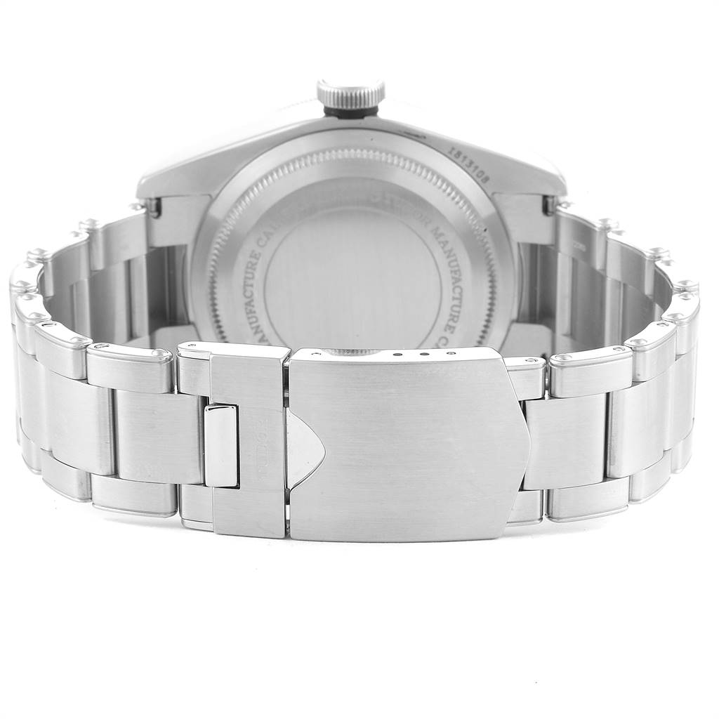 This image shows the back and clasp of a Tudor Heritage Black Bay 79230B Men
s Stainless Steel Black Dial 79230B Men
s Stainless Steel Black Dial watch, displaying its metal bracelet and case back.