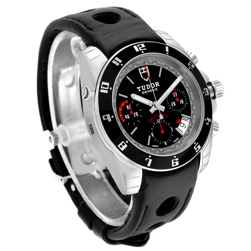 The image shows a Tudor Grantour 20350N-BKSLPL Men
s Stainless Steel Black Dial 20350N-BKSLPL Men
s Stainless Steel Black Dial watch at a slight side angle, featuring its black leather strap, bezel, dial, and chronograph subdials.