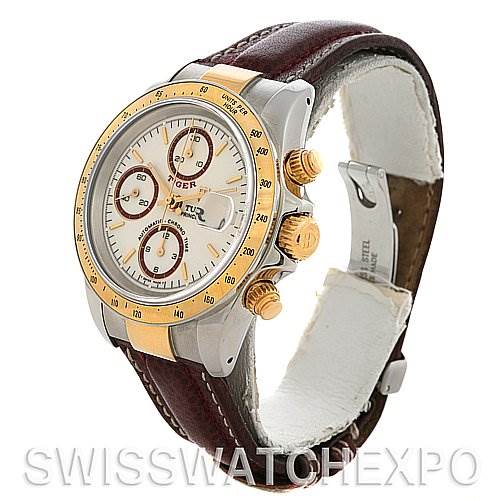 The image shows an angled view of the Tudor Tiger 79263 Men's Yellow Gold Champagne Dial 79263 Men's Yellow Gold Champagne Dial model watch, highlighting its face, gold bezel, crown, pushers, and leather strap.