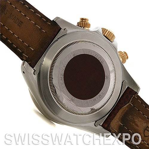 This image shows the back of a Tudor Tiger 79263 Men's Yellow Gold Champagne Dial 79263 Men's Yellow Gold Champagne Dial watch, including the caseback and part of the leather strap.