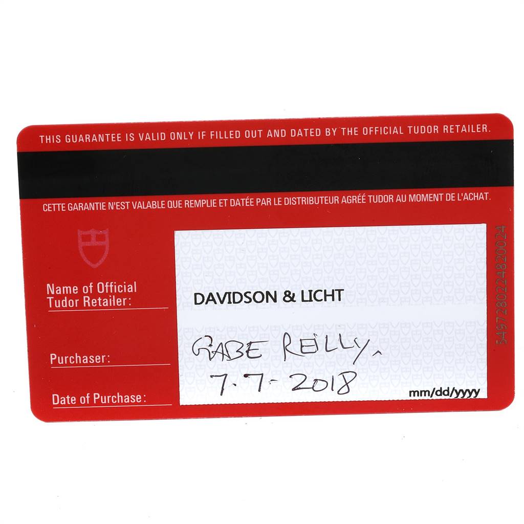 This is a close-up image of the warranty card for the Tudor Heritage Black Bay 79830RB Men's Stainless Steel Black Dial 79830RB Men's Stainless Steel Black Dial model.