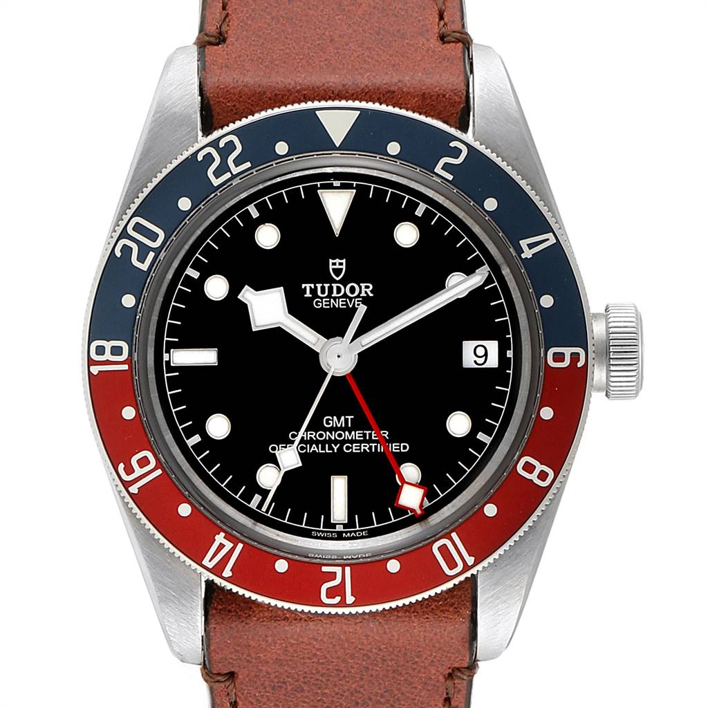 The Tudor Heritage Black Bay 79830RB Men's Stainless Steel Black Dial 79830RB Men's Stainless Steel Black Dial watch is shown from the front, highlighting its dial, bezel, crown, and leather strap.