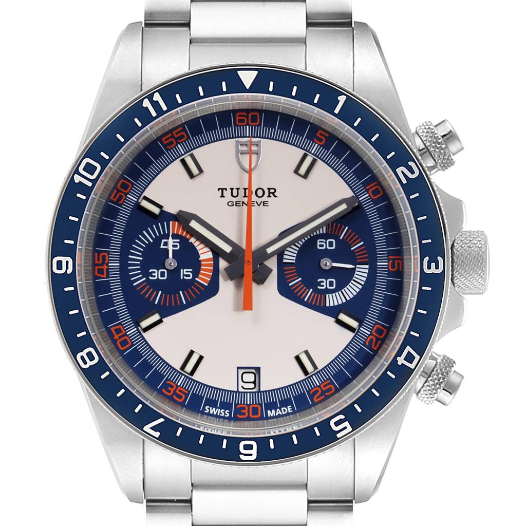 The image shows a front view of the Tudor Heritage Chrono 70330B Men
s Stainless Steel Blue Dial 70330B Men
s Stainless Steel Blue Dial watch, featuring a stainless steel casing and a colorful dial with subdials and date display.