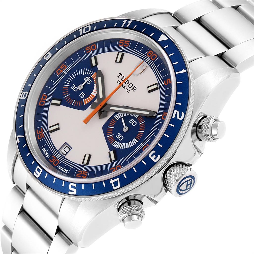 The image shows a close-up angled view of the Tudor Heritage Chrono 70330B Men
s Stainless Steel Blue Dial 70330B Men
s Stainless Steel Blue Dial watch, highlighting the watch face, bezel, and crown.