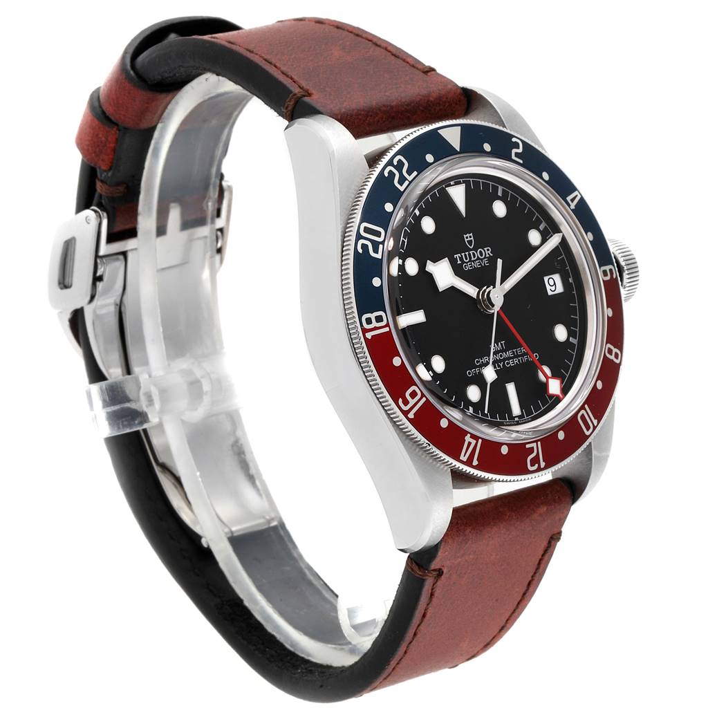 The image shows a side view of the Tudor Heritage Black Bay 79830RB Men's Stainless Steel Black Dial 79830RB Men's Stainless Steel Black Dial watch, highlighting its bezel, dial, and leather strap.