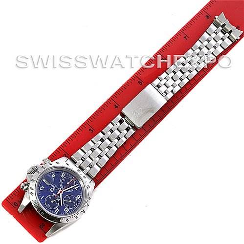The image shows the Tudor Tiger 79280 Men's Stainless Steel Blue Dial 79280 Men's Stainless Steel Blue Dial model watch laid flat with its bracelet fully extended next to a red ruler.