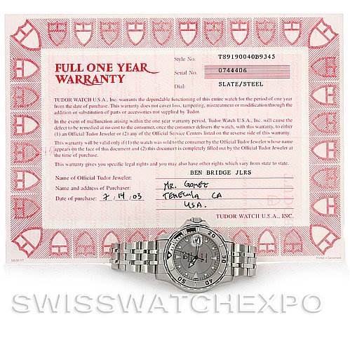 The image shows a front view of a Tudor Hydronaut 16220 Men's Stainless Steel Silver Dial 16220 Men's Stainless Steel Silver Dial model watch alongside its warranty card.