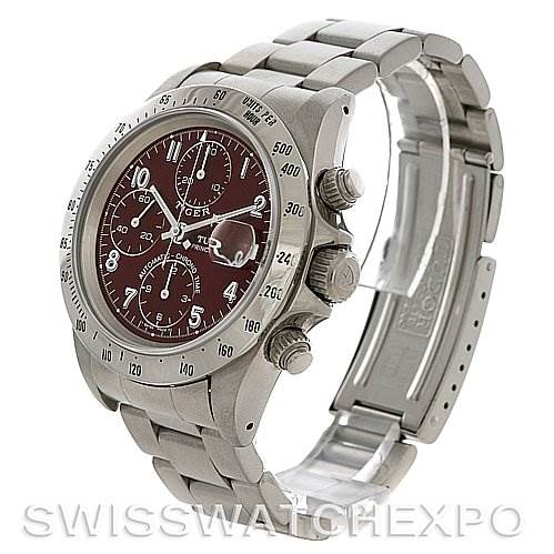The image shows a Tudor Tiger 79280 Men's Stainless Steel Burgundy Dial 79280 Men's Stainless Steel Burgundy Dial watch at a slight angle, highlighting the bezel, crown, pushers, bracelet, and open clasp.