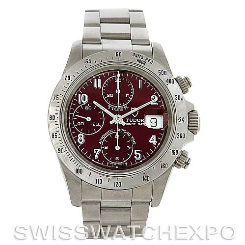 The image displays a front view of the Tudor Tiger 79280 Men's Stainless Steel Burgundy Dial 79280 Men's Stainless Steel Burgundy Dial model watch, showcasing its bracelet, red dial, and three sub-dials.