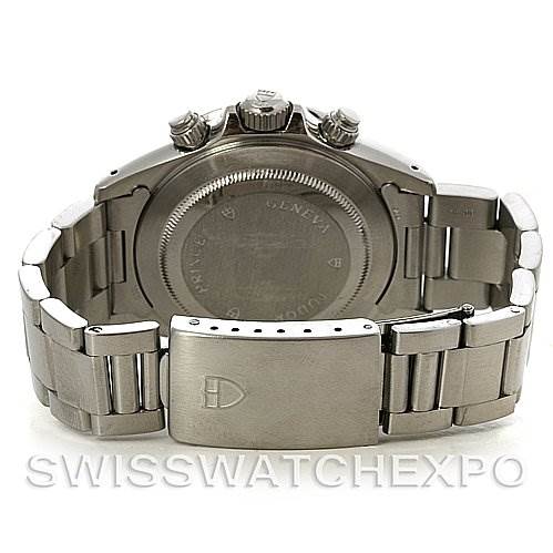 The image shows the back view of a Tudor Tiger 79280 Men's Stainless Steel Burgundy Dial 79280 Men's Stainless Steel Burgundy Dial model watch, displaying the case back, crown, pushers, and the bracelet with the clasp.