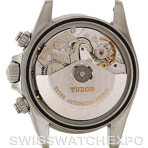 The image shows the back view of a Tudor Tiger 79280 Men's Stainless Steel Burgundy Dial 79280 Men's Stainless Steel Burgundy Dial watch, revealing its automatic movement mechanism and inner components.
