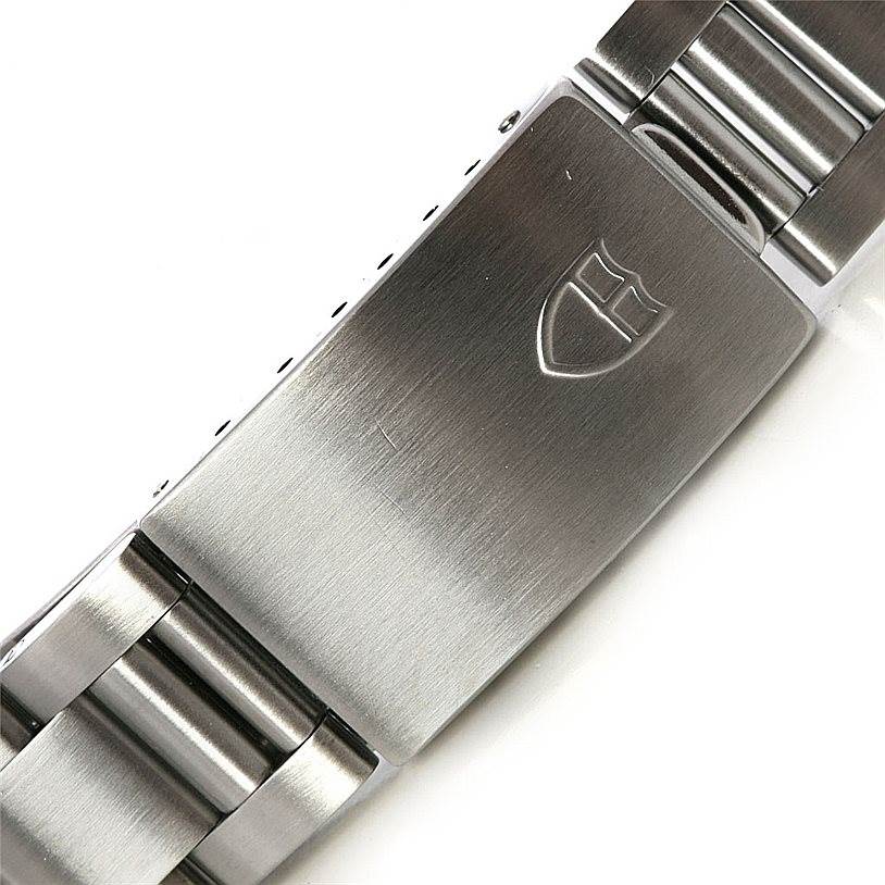 This image shows a close-up of the clasp and part of the bracelet of a Tudor Prince watch.