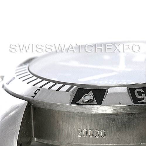 The image shows a close-up of the bezel and part of the case of a Tudor Hydronaut 20030 Men's Stainless Steel Black Dial 20030 Men's Stainless Steel Black Dial watch, focusing on the serial number and bezel markings.