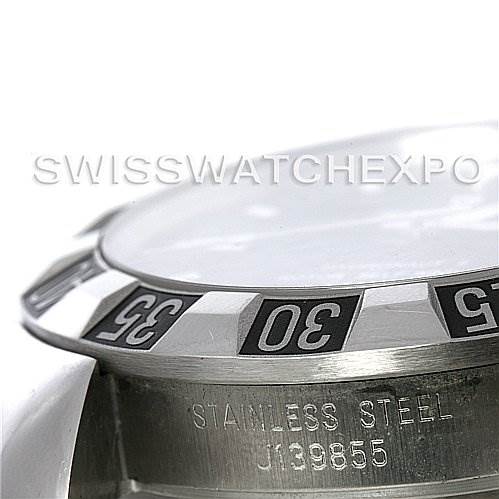The image shows the bezel and part of the case of a Tudor Hydronaut 20030 Men's Stainless Steel Black Dial 20030 Men's Stainless Steel Black Dial watch, highlighting its stainless steel and serial number.