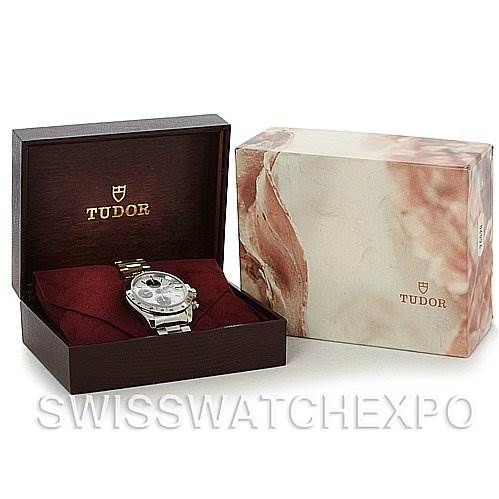 The image shows a Tudor Tiger 79280 Men's Stainless Steel White Dial 79280 Men's Stainless Steel White Dial model watch inside its open display box, with the outer box beside it.