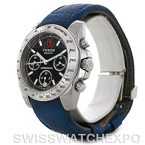 The image shows a Tudor Sport Chronograph 20300 Men's Stainless Steel Black Dial 20300 Men's Stainless Steel Black Dial watch at a three-quarter angle, highlighting its face, bezel, crown, pushers, and blue leather strap.