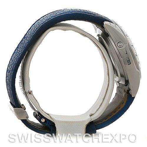 This image shows the left side of the Tudor Sport Chronograph 20300 Men's Stainless Steel Black Dial 20300 Men's Stainless Steel Black Dial watch, highlighting its side buttons and blue leather strap.