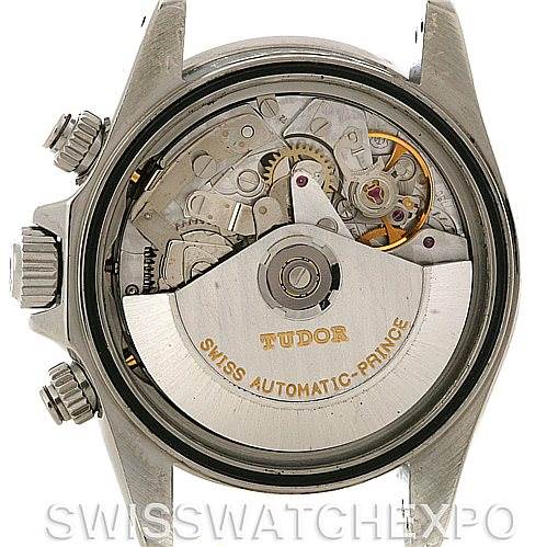 The image shows the back view of a Tudor Tiger 79260 Men's Stainless Steel Red Dial 79260 Men's Stainless Steel Red Dial model watch, revealing its automatic movement and internal mechanism.