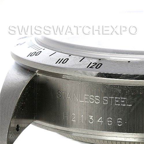 The image shows a close-up of the bezel and case side of a Tudor Prince watch, with "Stainless Steel" and a serial number engraved.