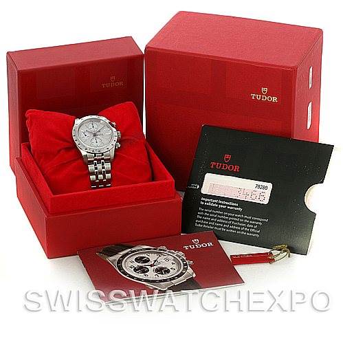 The image shows a Tudor Prince watch in an open box, accompanied by documents and packaging.