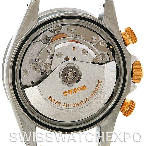 This image shows the back view of a Tudor Tiger 79263 Men's Steel and Gold (two tone) White Dial 79263 Men's Steel and Gold (two tone) White Dial model watch, revealing its internal automatic movement and components.