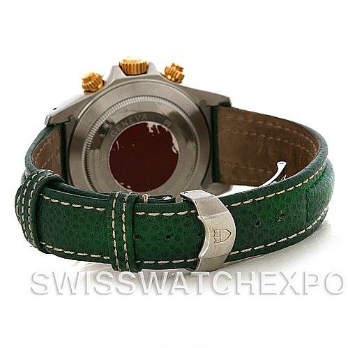 The image shows the back of a Tudor Tiger 79263 Men's Steel and Gold (two tone) White Dial 79263 Men's Steel and Gold (two tone) White Dial model watch, highlighting its green leather strap and gold-toned crown.