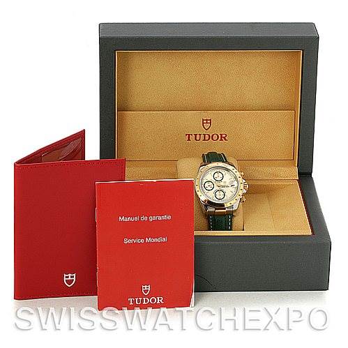 The image shows a Tudor Tiger 79263 Men's Steel and Gold (two tone) White Dial 79263 Men's Steel and Gold (two tone) White Dial watch in its open box along with warranty and service booklets placed in front.